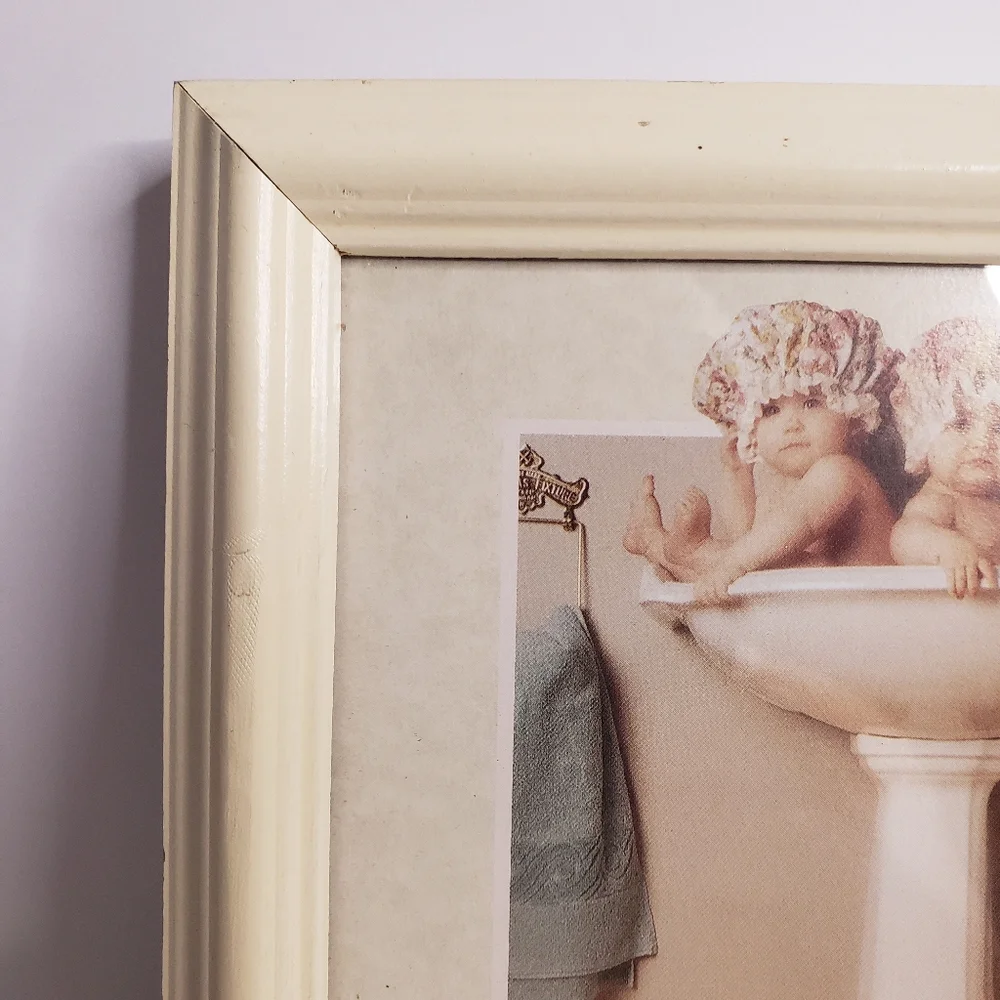 Framed print of Anne Geddes' 